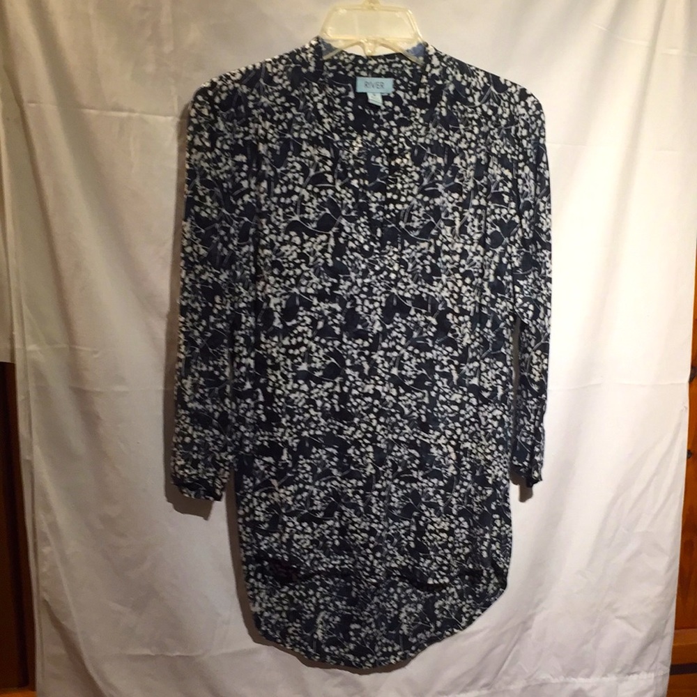 Tunic size S with a batik style fabric.  3/4 sleeves